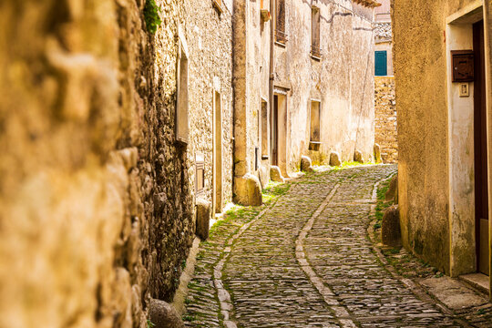 Fototapeta Italy, Sicily, Trapani Province, Erice. Narrow cobblestone streets in the ancient hill town of Erice.