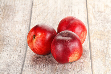 Ripe sweet juicy nectarines heap