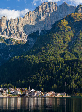 Alleghe at Lago di Alleghe under the peak of Civetta, an icon of the dolomites in the Veneto, Italy. Civetta is part of the UNESCO World Heritage Site.