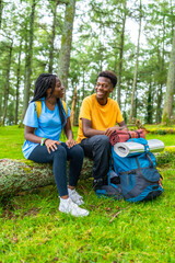 African couple enjoying a day in the forest