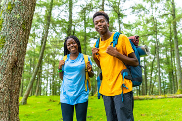 African friends enjoying nature in the forest