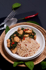Thai food concept Khao pad krapao, kapow kai Authentic Thai Basil Chicken and rice