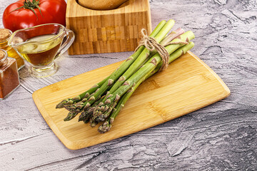 Vegan raw green asparagus heap