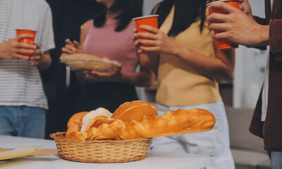 Group of young friends eating pizza.Home party.