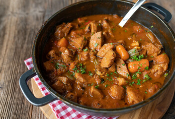 Delicious and healthy chicken stew or ragout with vegetables and brown sauce fresh and homemade...