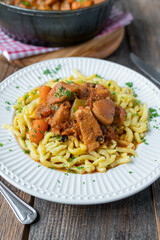 Braised chicken breast with vegetables and gravy