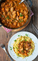 Braised chicken breast with vegetables and gravy