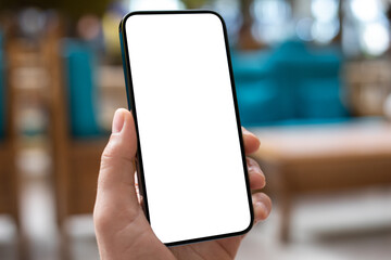 male hand holding phone with isolated screen background blue cafe