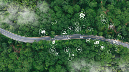 EV car, Electric car or hydrogen energy car on road midst forest and natural. Environmental...