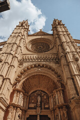 Fototapeta premium Photos show the beautiful streets and buildings of Palma, Mallorca. From narrow alleys to historic architecture, including the famous cathedral, these images capture the charm and history of the city