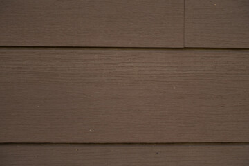 Obraz premium Macro of painted brown beveled wood siding
