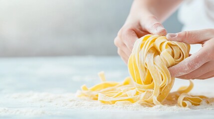 Homemade pasta being shaped with hands on a wooden surface in a bright kitchen.