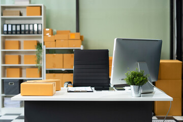 Workspace area small online business owner with laptop tablet smartphone on the table in the office concept.
