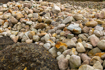 pile of rocks with some of them being yellow and brown