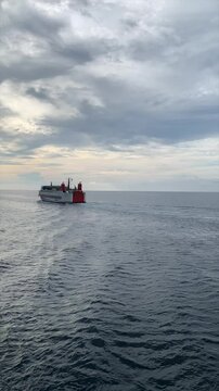Lombok, Indonesia - 17 April 2024 , ASDP Ferry water transportation. traveling in the wide ocean, sea travel uses a ferry. Vertical Video 4K 60 FPS.