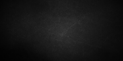 Dark black stone wall grunge backdrop texture background. monochrome slate grunge concrete wall black backdrop vintage marbled textured border background.	