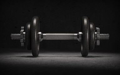 Dumbbell on dark background