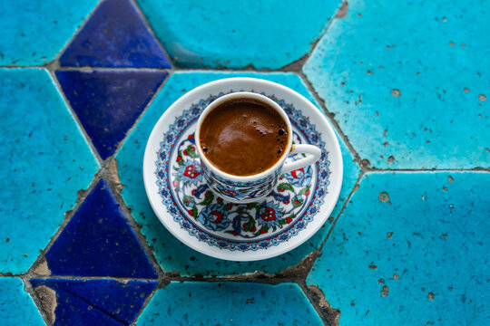 Turkish Coffee Cup and Turkish Delight on the Background of Ottoman Tile Motifs, Eminonu Fatih, Istanbul Turkiye (Turkey)