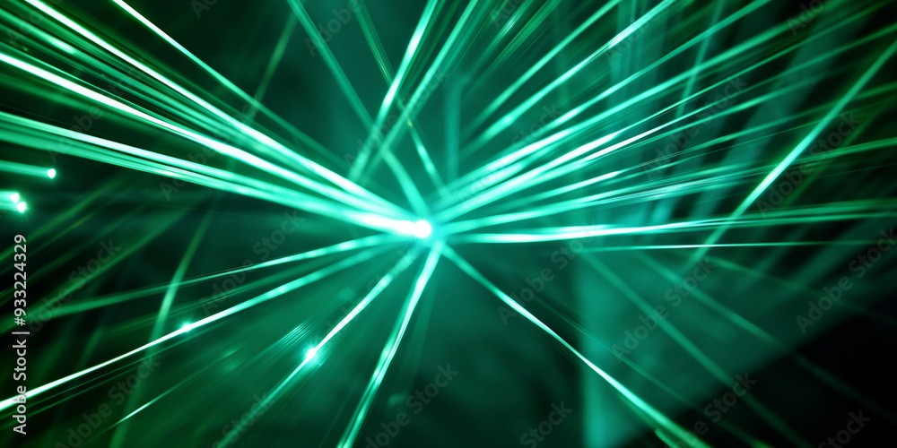 Wall mural abstract green laser light beams in motion creating dynamic streaks in a dark background