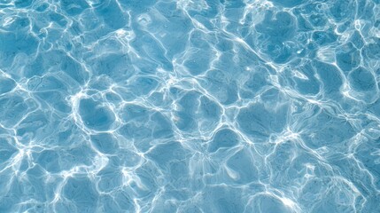 Obraz premium crystal clear blue water with rippling reflections