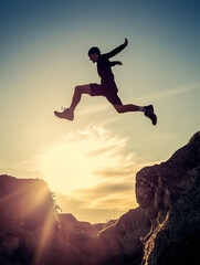 silhouette of a man jumping