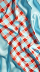 Obraz premium Elegant silk fabric with a vibrant red and blue checkered pattern, creating a smooth, luxurious texture. Perfect for textiles or background design.