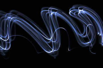 Light Painting Photography - swirly waves of neon light against a black background