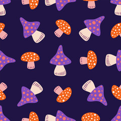 Purple and red mushrooms vector seamless pattern. Fly agaric, amanita muscaria poisonous mushrooms on dark blue background.