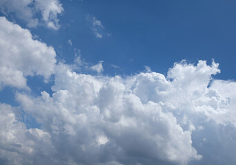 Bright sunny sky with beautiful white clouds