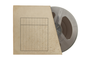 Old magnetic audio reel in the cardboard box isolated
