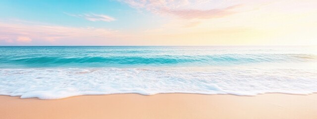Obraz premium A tranquil beach scene with smooth sand, gentle waves, and pastel colors in the sky
