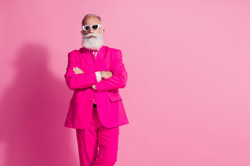 Photo of serious old cool man gentleman boyfriend crossed hands wear sunglass stylish pink suit...