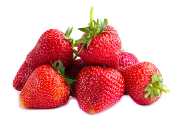 Vivid colorful red strawberries on a white background.