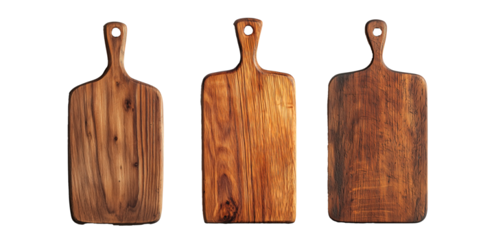 Three empty wooden cutting boards with handles, on PNG cutout transparent background.