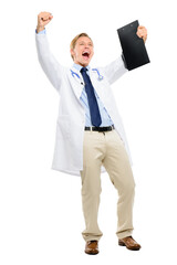 Happy man, doctor and winning with clipboard in celebration for success in studio on a white background. Excited male person or young medical employee with smile for achievement, victory or promotion