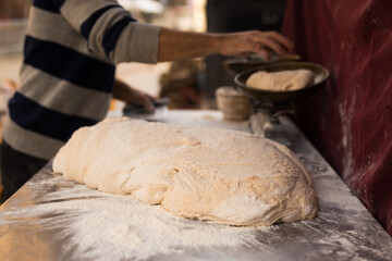 Yeast dough on baking table. cooking process
