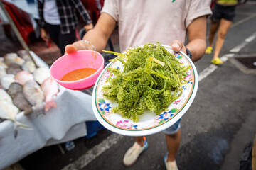 Seaweed salade on the plate on the market in Kota Kinabalu Borneo Malaysia