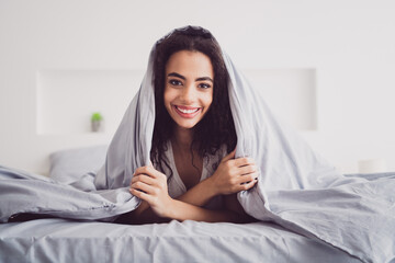Photo of young attractive woman lying bed covered blanket wear stylish pajama soft comfy bedroom white room interior inside