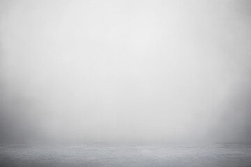Fototapeta premium A serene minimalist scene with a soft gradient from misty white to gray, evoking calm and tranquility.
