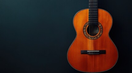 Obraz premium Classical Guitar Against Dark Background