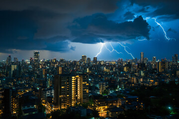 Obraz premium Eternal Lightning, continuous flashes of lightning illuminate the night sky above the city