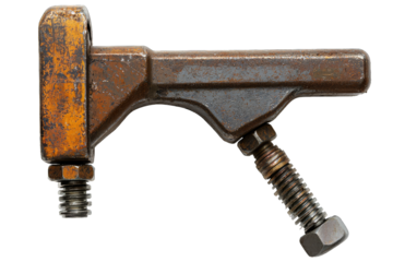 Close-up of a weathered metal clamp showcasing its intricate design and rust for industrial applications.