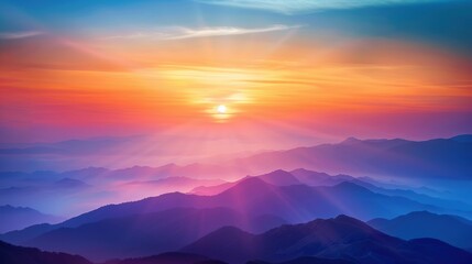 A captivating sunrise over a vast mountain range, with rays of light illuminating the landscape in stunning shades of pink, purple, and blue.
