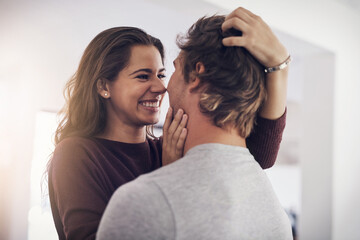 Smile, love and couple in kitchen with embrace, morning bonding together and affection in home. Romance, happy man and woman hug with care, connection and relax with relationship support in apartment