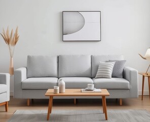 Fototapeta premium style living room, gray sofa with three seats and coffee table in front of it, white walls behind the wall