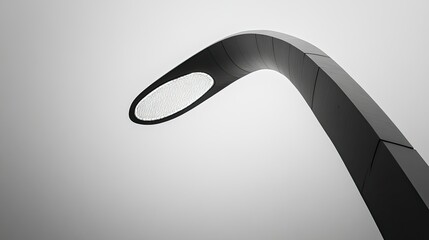 Abstract close-up of a minimalist bridge lamp with clean lines and a smooth, monochrome background