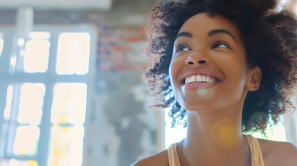 Beautiful girl is thinking how to arrange all her things in the new apartment. Young woman is smiling and looks happy. Concept of moving. 