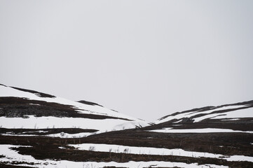 snowy landscape along the road from the island of Mageroya to Alta, Norway