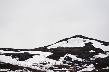 snowy landscape along the road from the island of Mageroya to Alta, Norway
