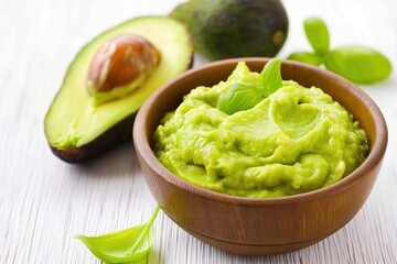 Obraz premium Guacamole in a plate isolated on white background